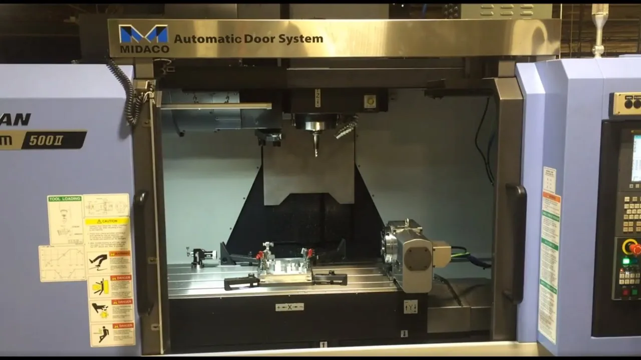 Thumbnail for a Midaco demonstration of an automatic CNC door for robot and cobot access