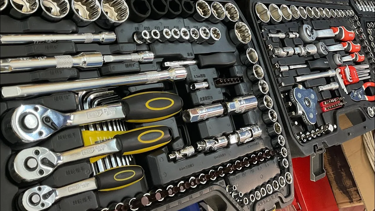An open YATO socket set with ratchets, extensions and sockets in a blow-moulded case, filmed at a tool retailer in Surat
