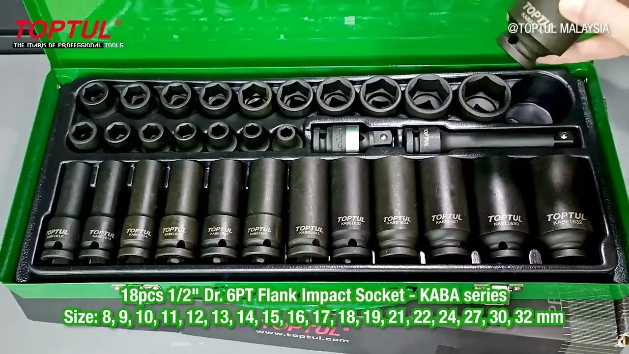 An open green TOPTUL case of 1/2-inch drive flank impact sockets with a hand holding one socket above it